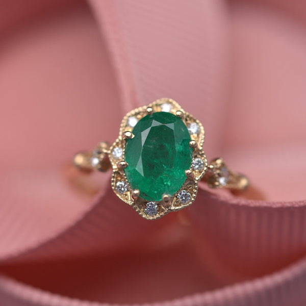Oval Emerald and Diamond Halo Ring | Pravins